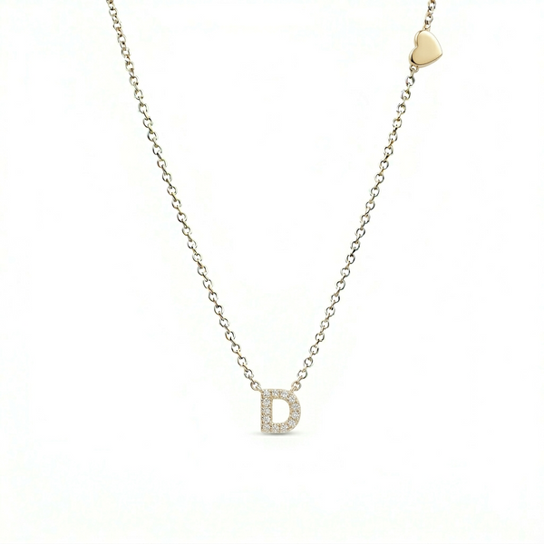 GOLD DEMURE LETTER NECKLACE