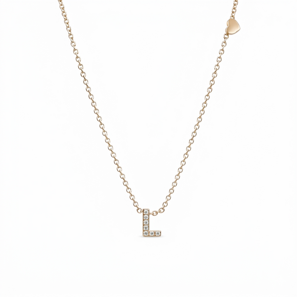 GOLD DEMURE LETTER NECKLACE