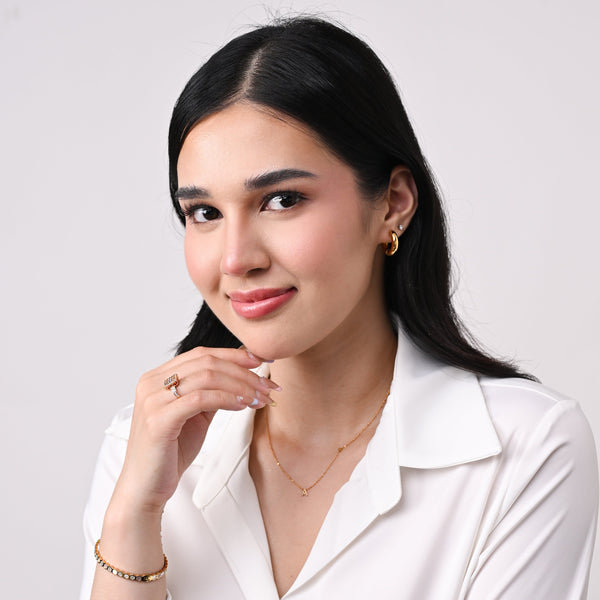 GOLD DEMURE LETTER NECKLACE